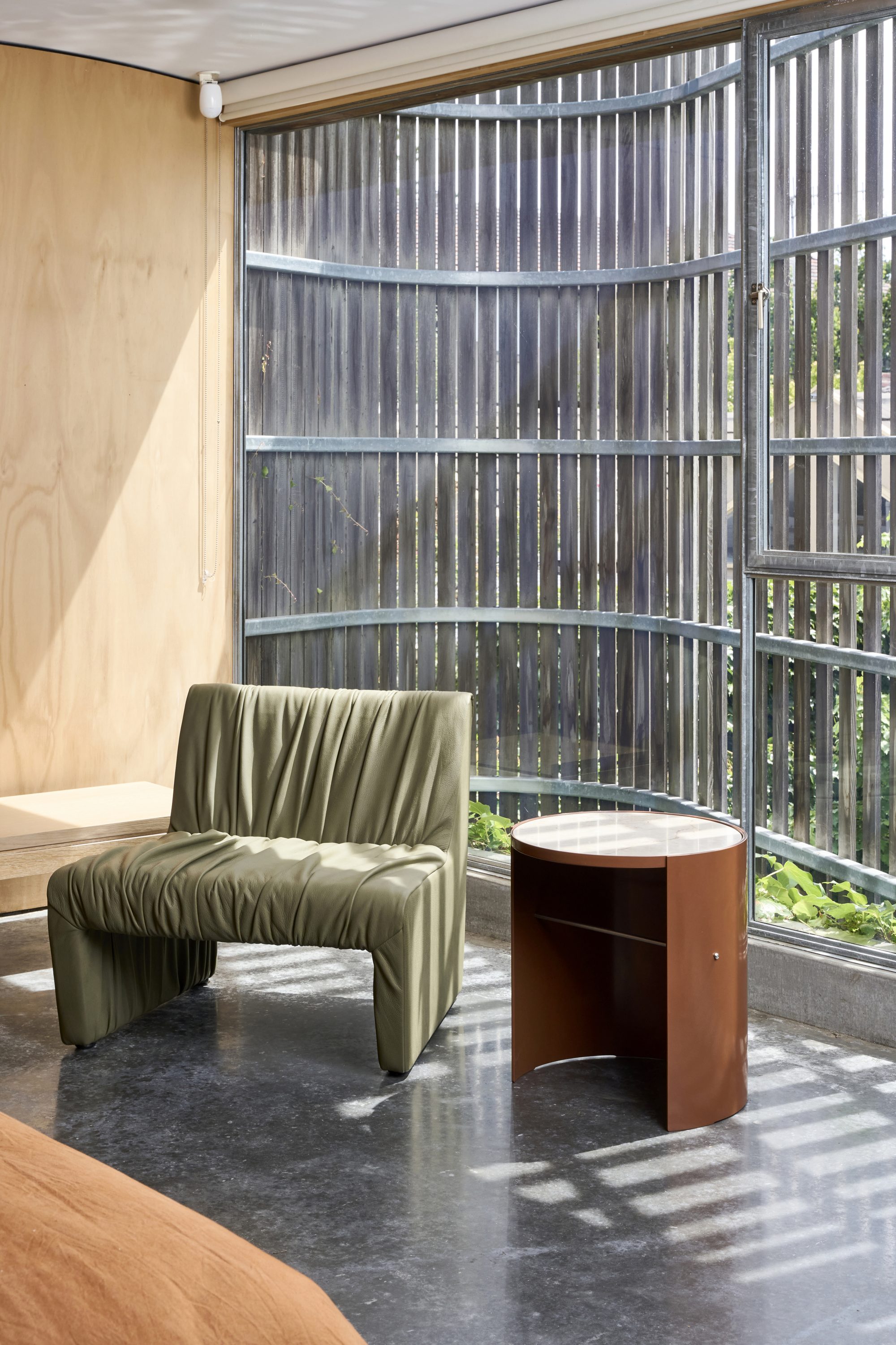 ruched reeno leather chair and stamp side table in earth PC and aurora stone top