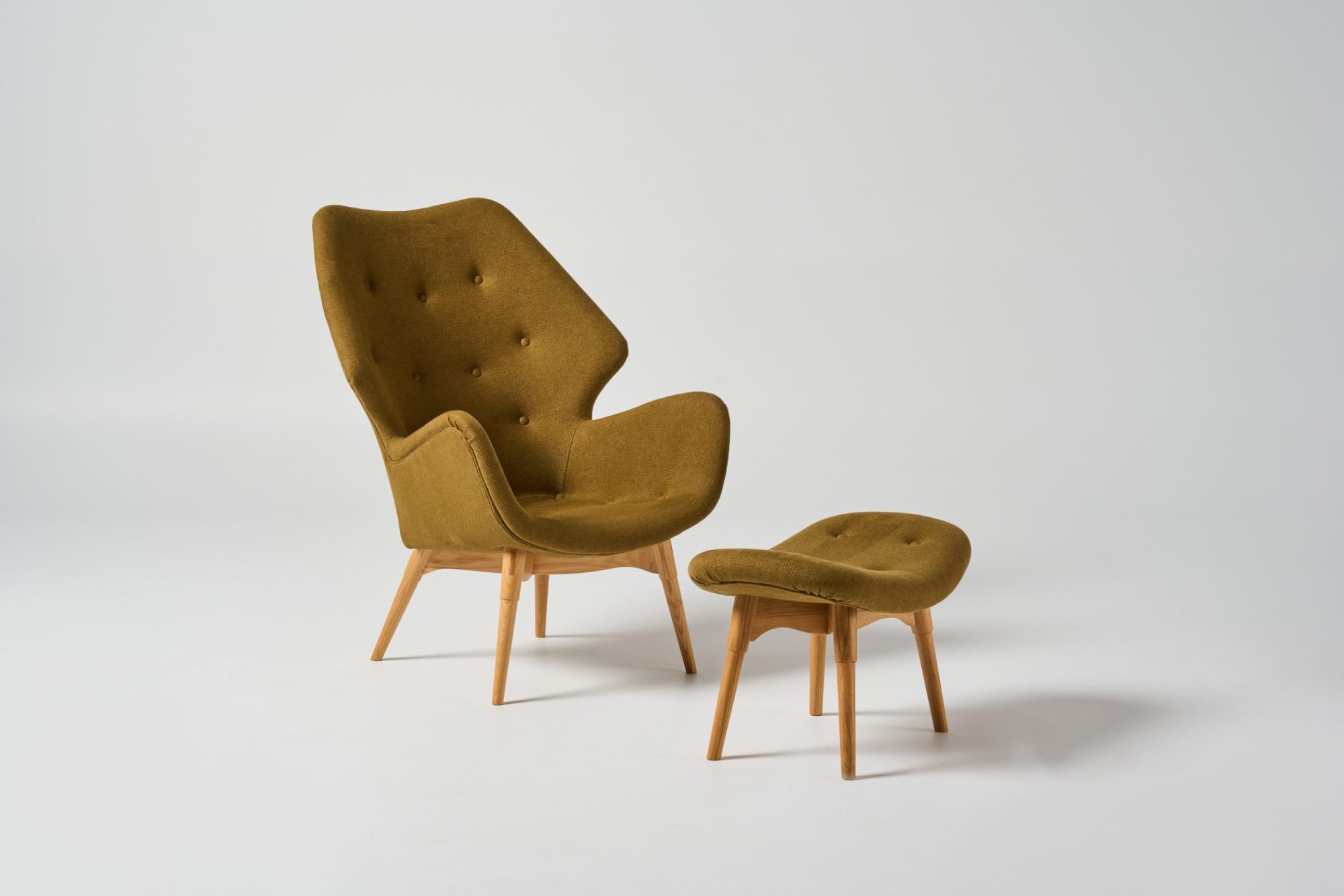 Featherston B230 with S200 ottoman in custom upholstery.