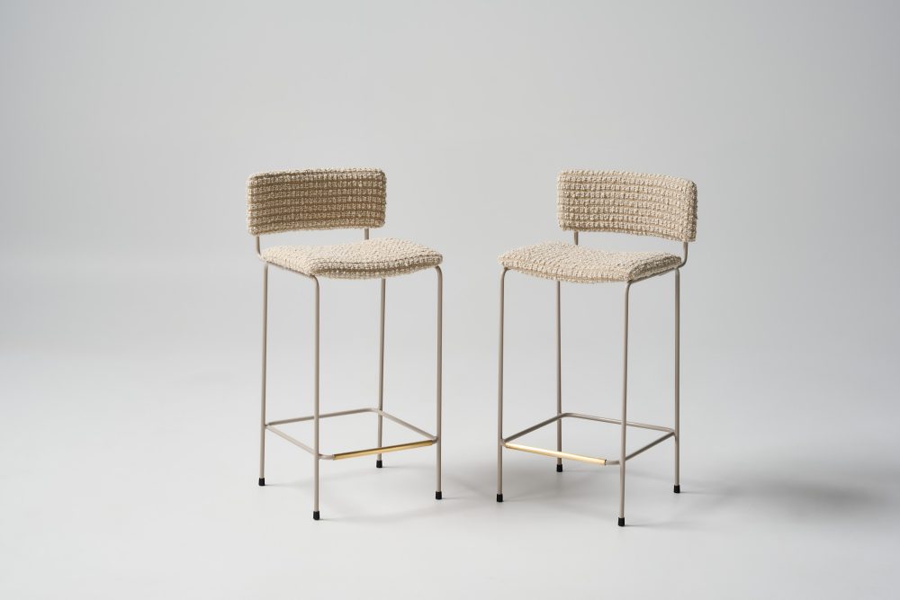 Dita stools 650sh with custom upholstery and dune pc legs and brass footrail