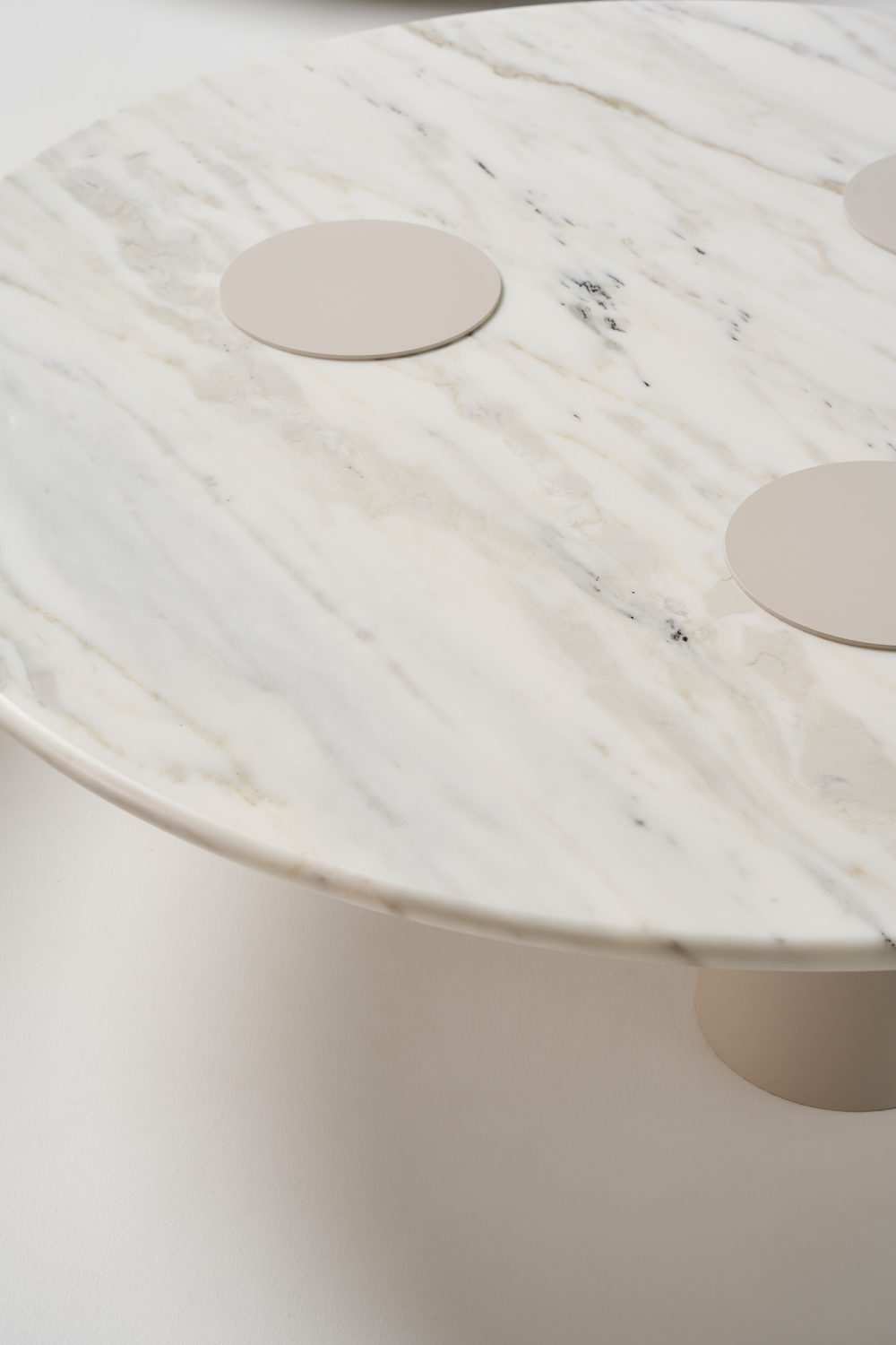 detail Ivy coffee table 1000dia with calacatta stone top and texture suede pc legs