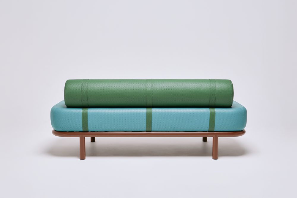 graziaco etta ottoman with bolster back in custom green and aqua perforated leather upholstery rear view