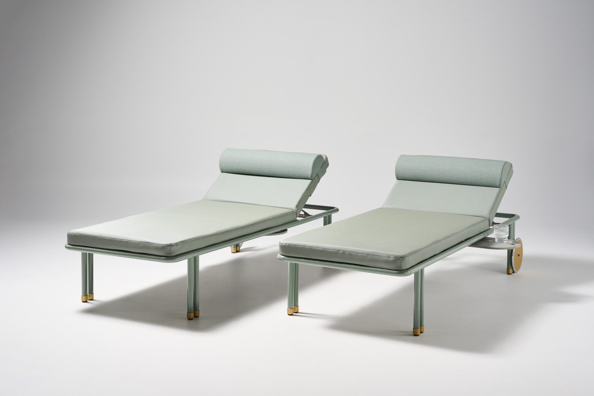 Salina sunlounger with custom upholstery and transformer grey gloss pc frame and gold wheel and feet caps