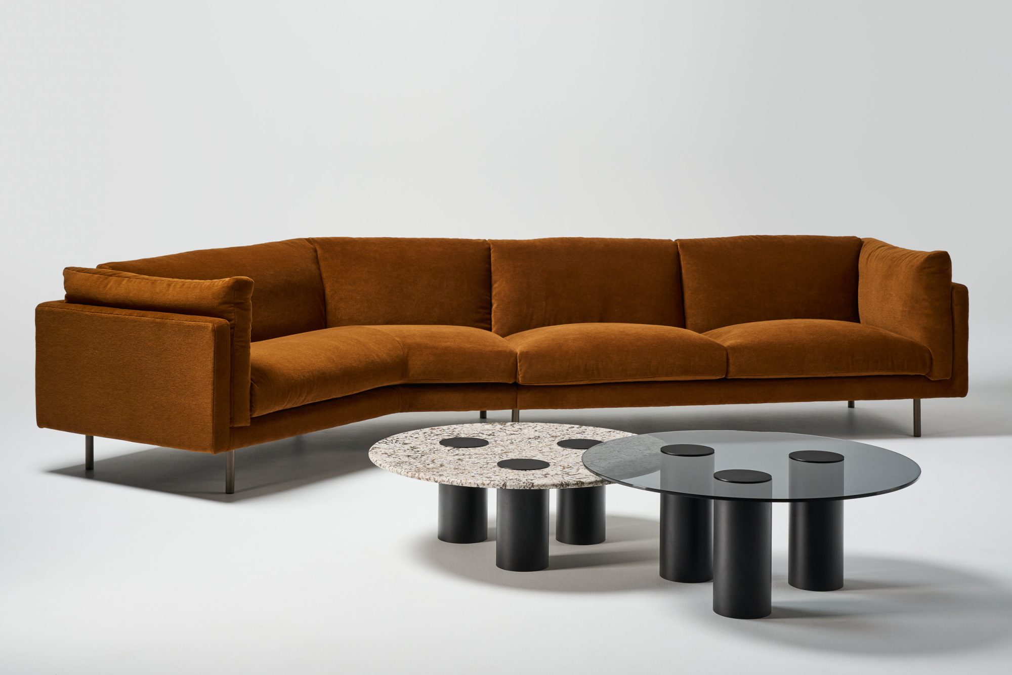 Harvey angle sofa bronze alpaca velvet and ivy coffee tables with luna stone top and smoked grey glass top and texture black pc legs